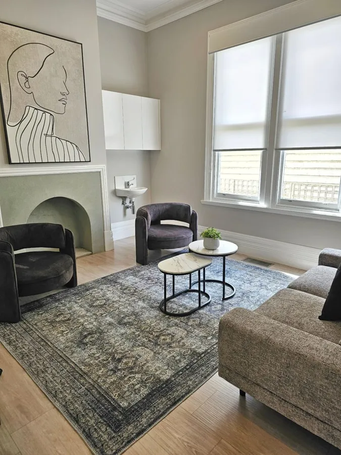 Lounge-style counselling room with soft seating